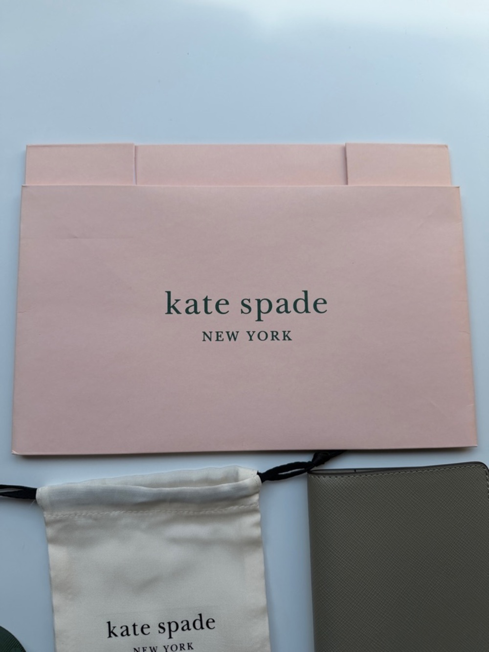 kate spade card holder & passport wallet with gold logo in oyster shell color - Picture 8 of 14